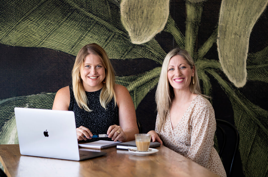 Sarah Rail working with a client on brand and marketing strategy